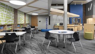 A modern classroom featuring flexible seating, collaborative work tables, and vibrant wall designs, encouraging creativity and learning.
