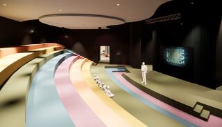 A colorful, tiered seating area in a modern space designed for children's church, featuring a welcoming stage and vibrant decor.