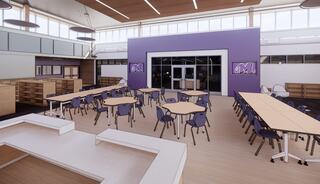 A spacious, modern classroom with purple accents, featuring multiple tables, chairs, and bright natural light from large windows.