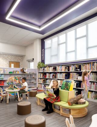 A bright children's area features colorful seating, bookshelves filled with books, and kids engaged in reading and play.
