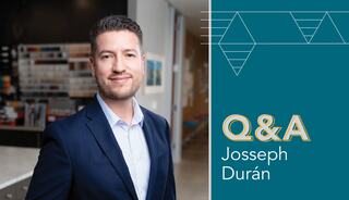 Josseph Duran, architect at FGMA, stands confidently, smiling in a modern corporate setting with design samples in the background, highlighted by a Q&A graphic that reads, "Q&A; Josseph Duran"