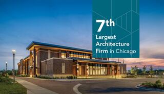 Downers Grove Civic Center, designed by FGM Architects, photographed at dusk with dark blue skies and pink and yellow clouds.