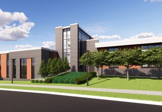 A modern building rendering for the new St. Louis Community College Transportation Education Center features sleek lines and a mix of brick and glass facades, surrounded by greenery and open space under a clear blue sky.