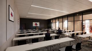 A modern classroom with rows of tables and chairs, featuring large windows and minimalist decor, ideal for presentations or lectures.
