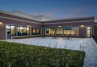 A private outdoor terrace for staff is next to the green vegetative roof, a sustainable initiative in the Downers Grove Civic Center plan