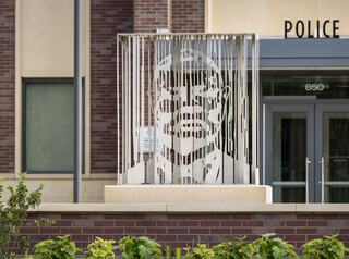 Metal sculpture shows a portrait of Isrel or Israel Blackburn, one of the original founders of Downers Grove, Illinois. His legacy is honored in the Civil Rights Plaza at the entrance of the new Downers Grove Civic Center