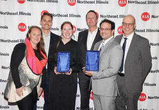 Six team members from FGM Architects holding awards won at the 2025 AIA NEI Awards ceremony