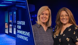 Two women smile in a modern educational space, featuring a glowing sign that reads "CENTER FOR IMMERSIVE LEARNING."