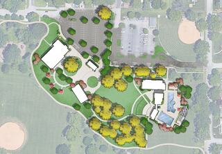 Aerial layout of a park featuring buildings, diverse greenery, a swimming pool, parking areas, and recreational fields.