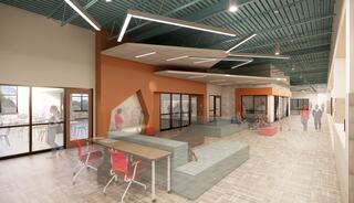 A spacious, modern interior featuring seating areas, large windows, and vibrant colors, designed for collaboration and social interaction.