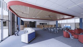 A modern library space featuring a sleek reception desk, flexible seating areas, and large windows, fostering an inviting study environment.
