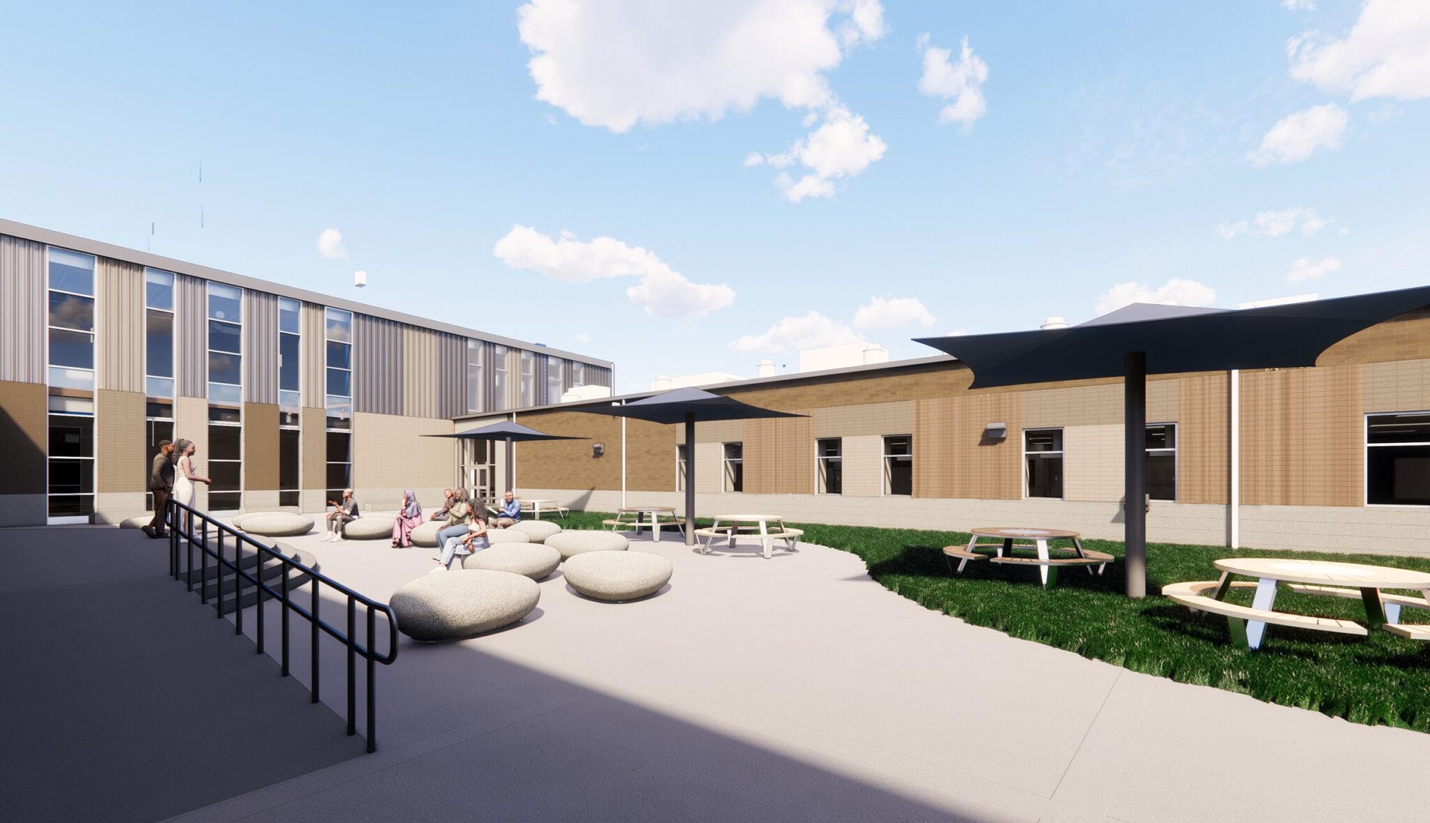 A modern outdoor space features casual seating, picnic tables, and shaded areas, surrounded by a contemporary building under a clear sky.